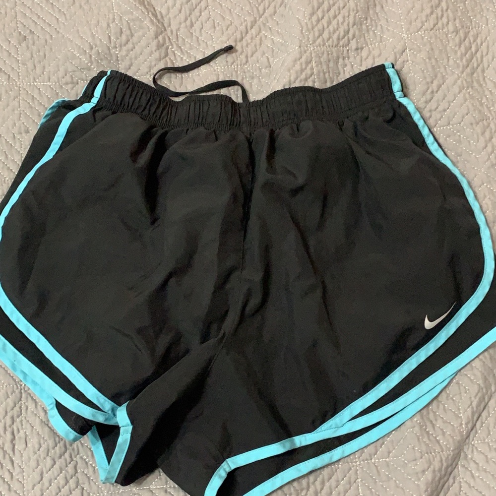 Blue and black Nike shorts